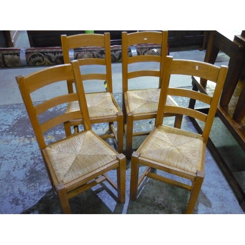 455 - Set of four beech rush seated ladder back kitchen style chairs