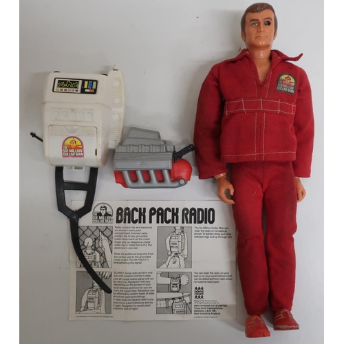 62 - Six Million Dollar Man action figure, red suit with breast badge, with backpack radio and instructio... 