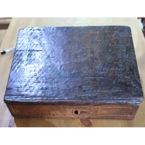 485 - Small 17th /18th century and later oak and walnut reliaqery box, the hinged lid revealing a bone and... 