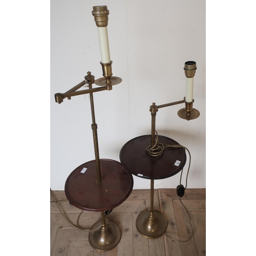 39 - Pair of 20th C adjustable floor lamps with turned circular mahogany centre table, with turned brass ... 