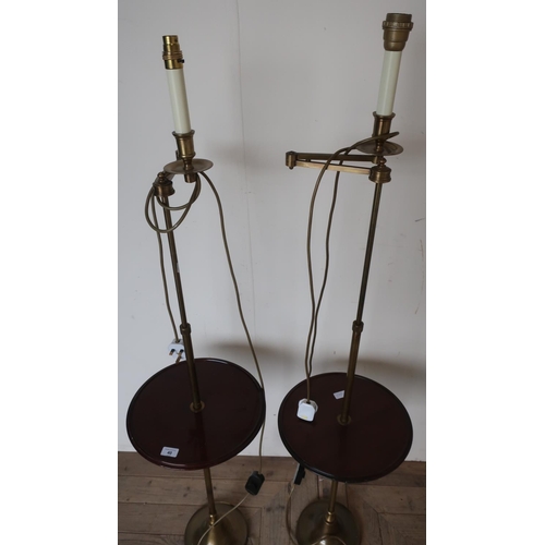 40 - Pair of 20th C adjustable floor lamps with turned circular mahogany centre table, with turned brass ... 