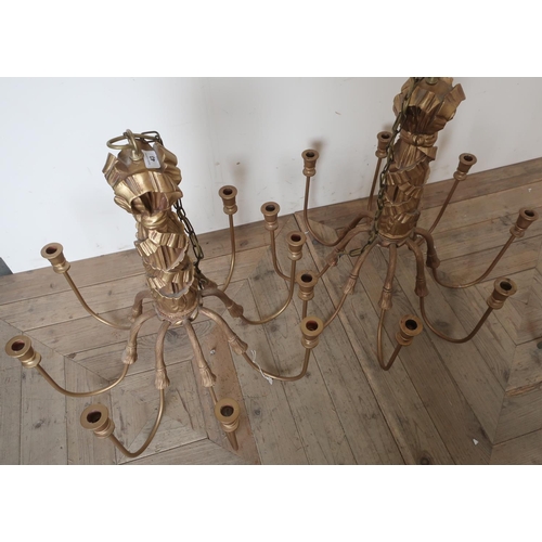 43 - Pair of Regency style gilt wood and metal eight branch centre hanging chandeliers (height 65cm)