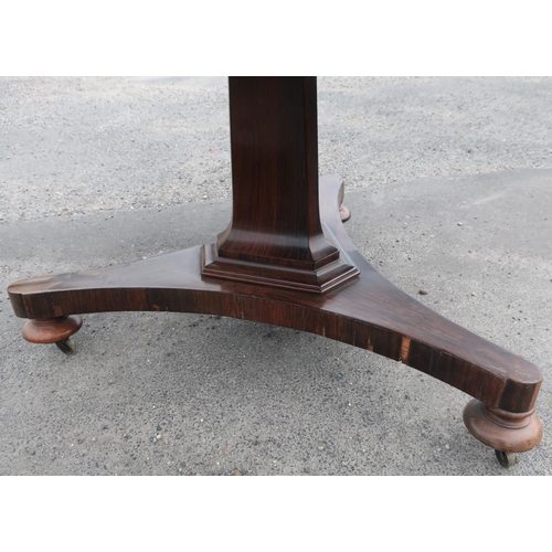 48 - Victorian rosewood breakfast table circular tilt top on tapering column and three bun turned feet (d... 