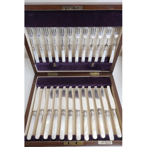 92 - Set of twelve EPNS dessert knives & forks with Mother of Pearl handles, in fitted case by Walker & H... 