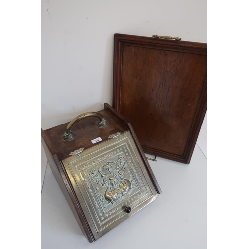 348 - Victorian walnut coal box, slope front decorated with a brass panel embossed with two exotic birds w... 
