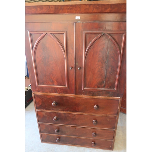 353 - Victorian mahogany linen press, moulded cornice above two Gothic arch moulded doors and four long dr... 