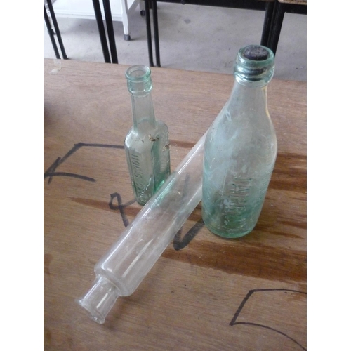 230 - Glass rolling pin, a lemonade bottle by Rob Revely of Jarrow and a Hoes sauce bottle