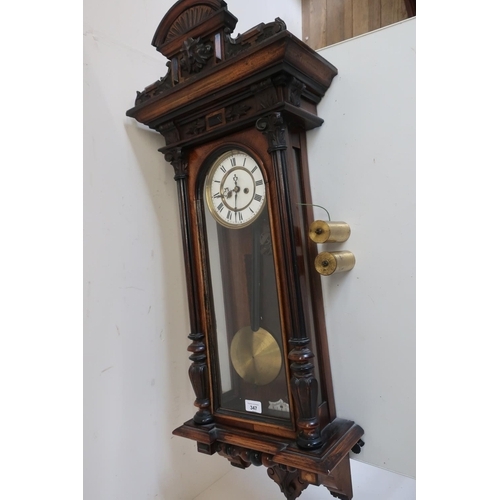 347 - Victorian walnut and ebonised cased Vienna type wall clock, circular Roman dial and twin weight move... 