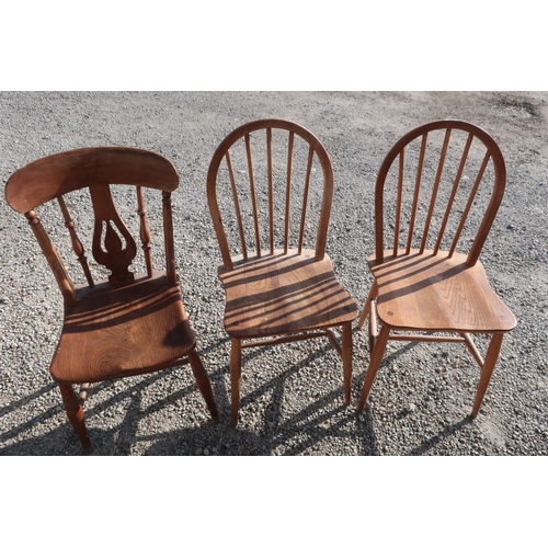 138 - Pair of light elm Ercol stick back chairs and another country style elm chair (3)