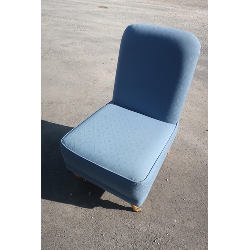 388 - Laura Ashley nursing chair upholstered in blue self patterned fabric, on turned supports with brass ... 