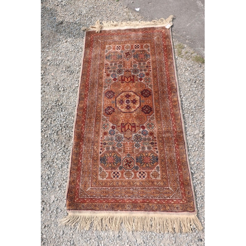 398 - 20th C middle eastern traditional pattern wool rug with central medallion and geometric pattern bord... 