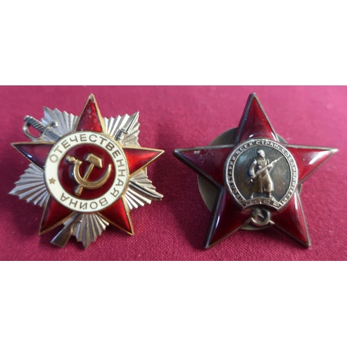 4 - Two Russian Soviet military cap badges including red enamel badge with central figure on an Infantry... 