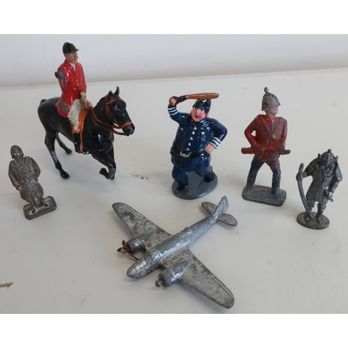 74 - Four Dinky small scale model die-cast aeroplanes, and a quantity of lead and other metal soldiers, e... 