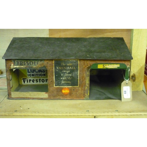 89 - Tinplate garage workshop building, with brick effect and Vauxhall, Shell, Firestone advertising (51c... 