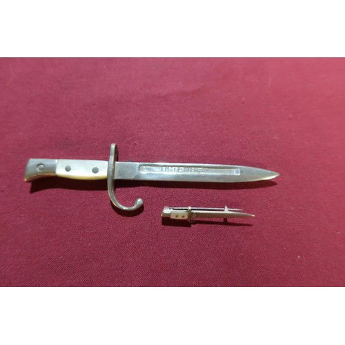34 - Miniature silver plated mother of pearl gripped souvenir bayonet marked ostende, similar bar brooch ... 
