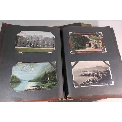 263 - Two postcard albums containing an extremely large quantity of various assorted postcards, mostly bla... 