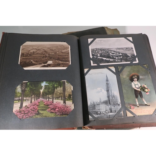 263 - Two postcard albums containing an extremely large quantity of various assorted postcards, mostly bla... 