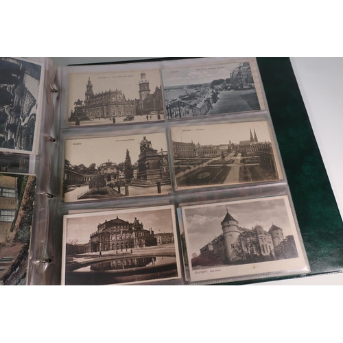 264 - A postcard album with internal date 1906 containing an extremely large quantity of various assorted ... 