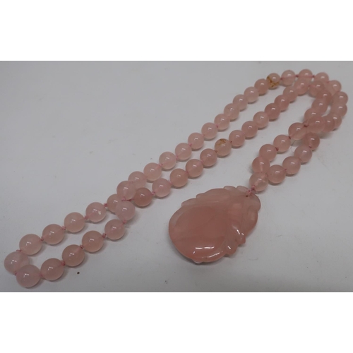 23 - Carved hardstone pendant and bead necklace