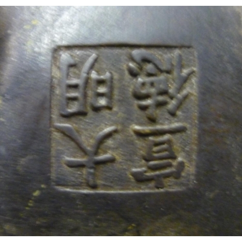 31 - Chinese bronze Archaic form censer, on three feet, (10.5cm)