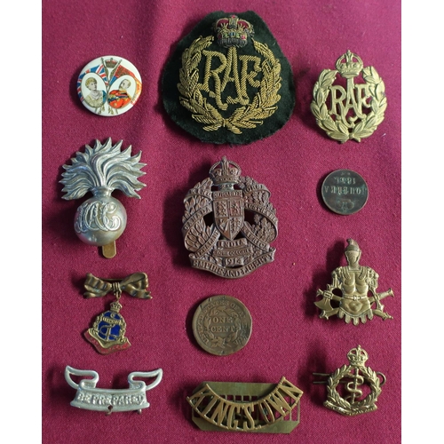 80 - Selection of various British military cap badges and shoulder titles including RAF, Royal Ordnance C... 