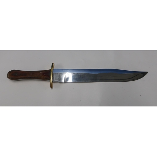 141 - Bowie type knife with 9 inch blade with brass cross piece and two piece wooden grip, made in Sheffie... 