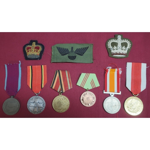 105 - Selection of unofficial and foreign medals including armed forces of Nigeria, and a small selection ... 