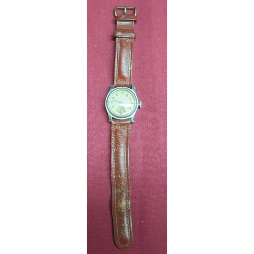 111 - WWII period brevet wristwatch owned by US war hero H. Cook, director of personal US Marine Corps, th... 