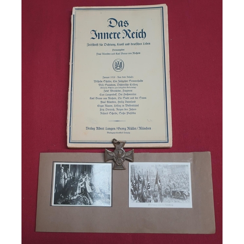 113 - German WWII period police medal, selection of various photo cards and a DAS Inner Reich book, 1938