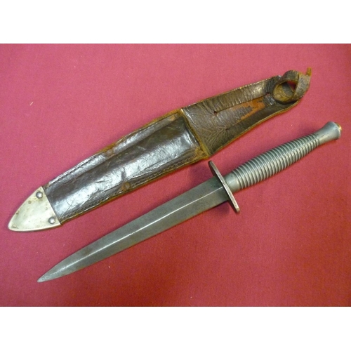 115 - WWI period Fairbairn Sykes commando dagger by Rogers of Sheffield with ribbed grip complete with ori... 