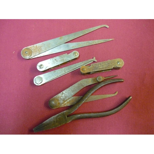 133 - Various assorted tools with military broad arrow marks, including calipers etc