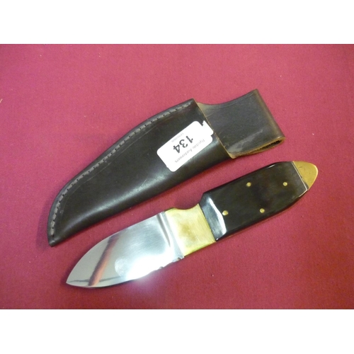 134 - 3 inch broad bladed sheath knife by R Cooper of Sheffield, with polished horn and brass mounts, spec... 