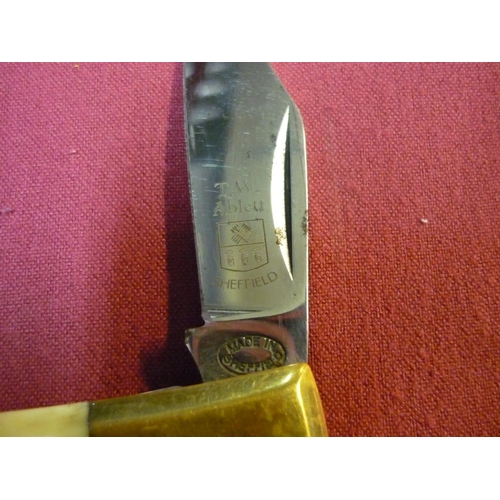 135 - Single bladed pocket knife by T. W. Ablett of Sheffield with two piece antler grips and brass mounts... 