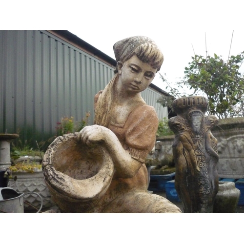 18 - Water feature of a young girl pouring water from a bucket