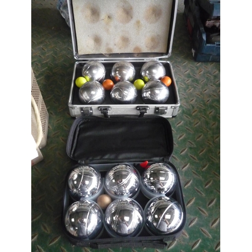 42 - Two sets of Boules