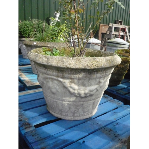 5 - Large reconstituted stone planter with fruiting vine decoration (diameter 31.5