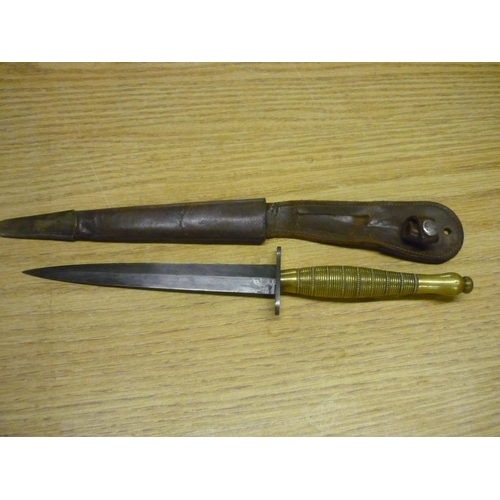50c - Fairbairn-Sykes commando knife with ribbed and beaded brass grip, complete with sheath