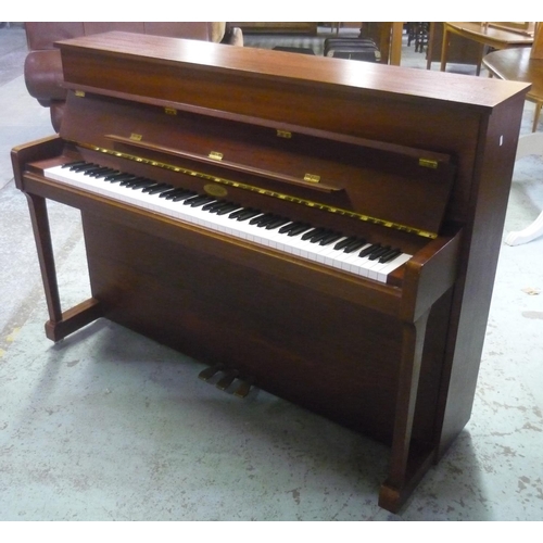 242 - Kemble of London mahogany cased upright piano, iron over strung, framed and numbered 268127 supplied... 