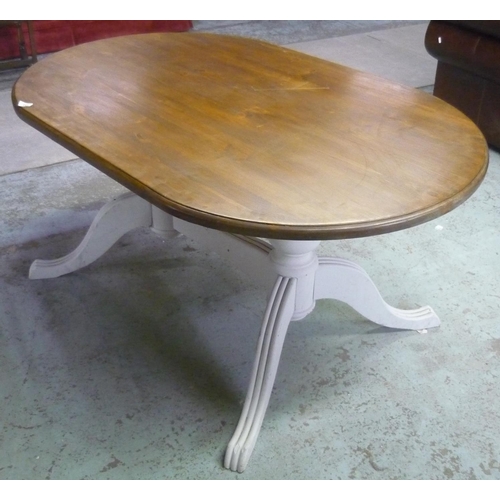 243 - Painted and stained pine dining table, oval top twin pedestal base joined with under stretched and f... 