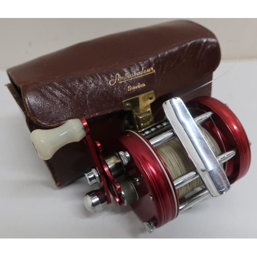 68 - Abu Ambassadeur multiplier 6000 fishing reel, red anodized finish, with instructions, oil, additiona... 