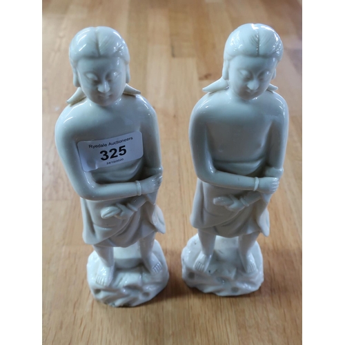 325 - Two Blanc-de-chine models of females (height 33cm)