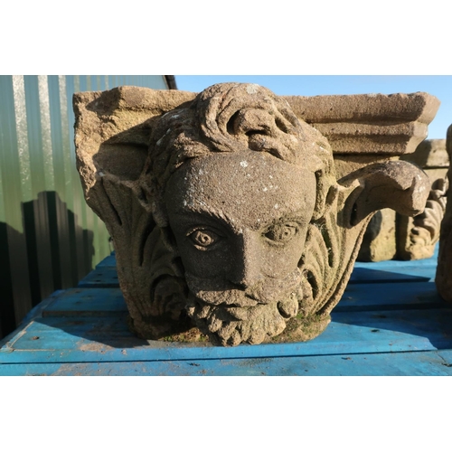298a - A set of four carved sandstone corbels `the four seasons' two of female faces and the other two male... 