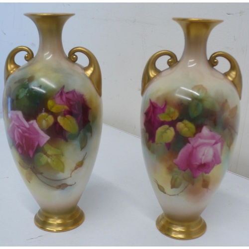 185 - Pair of Royal Worcester vases, ovoid bodies painted with roses, gilt handles and base, shape 284, (H... 
