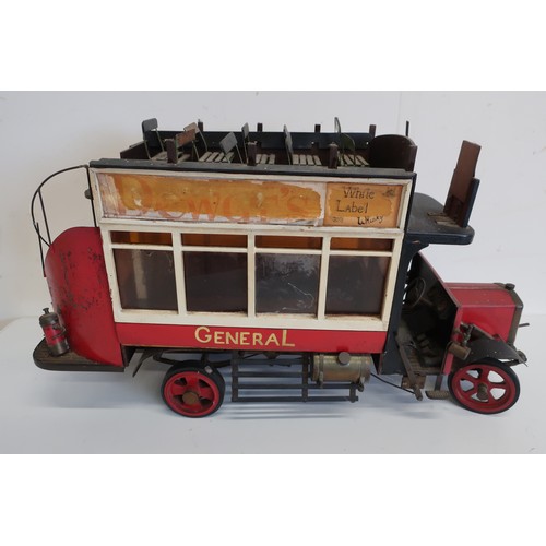 171 - Tinplate model of a vintage London bus L138, service 15C with Dewars Whisky advert, on spoked wheels... 