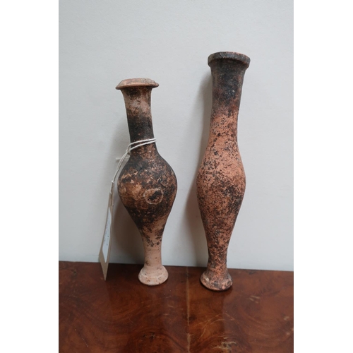 299 - Two 3-6 B.C Etruscan pottery tear catchers (H16cm)