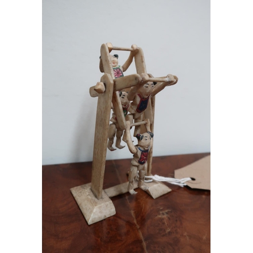 301 - Early 20th C Japanese Prisoner of War work articulated bone model of performing acrobats with painte... 