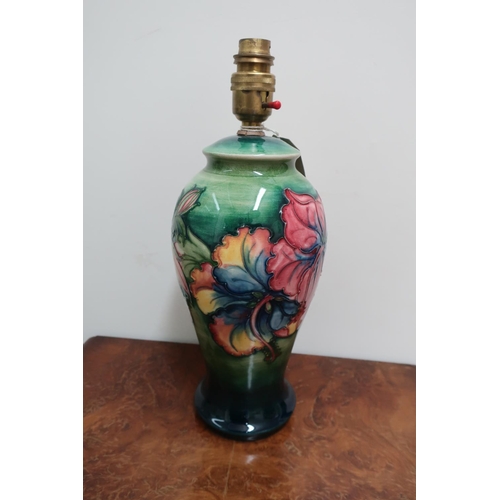 51 - Moorcroft Hibiscus pattern baluster shaped table lamp, with impressed green mark, (33.5cm max)
