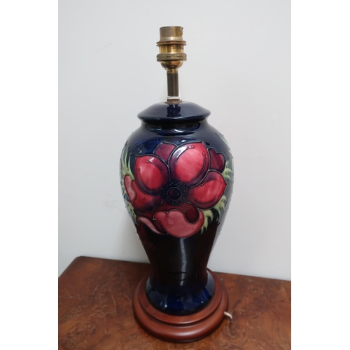 52 - Moorcroft Anemone pattern baluster table lamp, on wooden base, (37cm high max)