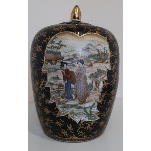 71 - Large Satstuma pottery vase and cover, decorated in relief panel with two female figures on a black ... 