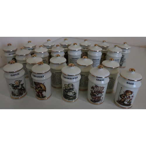 76 - Collection of twenty two M G Hummel spice jars and covers, decorated with children